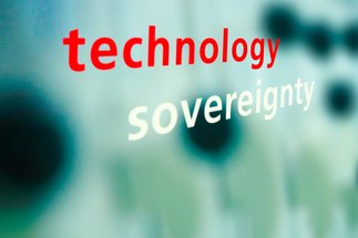 Blurry background, words "technology, sovereignty" in the foreground