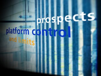 The image shows a glass wall with the words "platform control prospects and limits," featuring a blurred blue vertical line background.