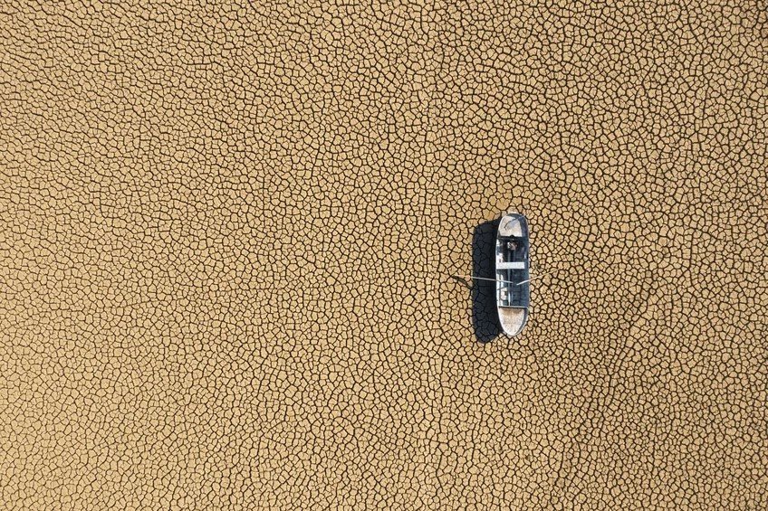 boat stranded on dry land