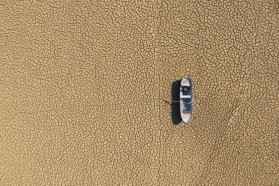 boat stranded on dry land