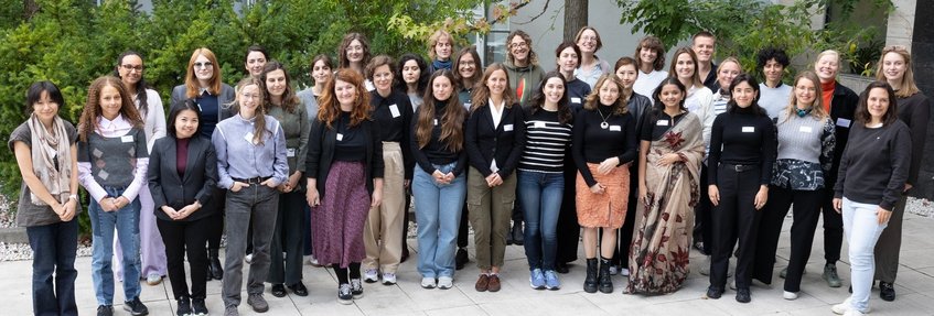 A space of empowerment and belonging Group photo of the approximately 35 participants and speakers