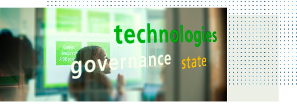 The words "technologies, state, governance" are visible on a glass surface, with digital content displayed behind.