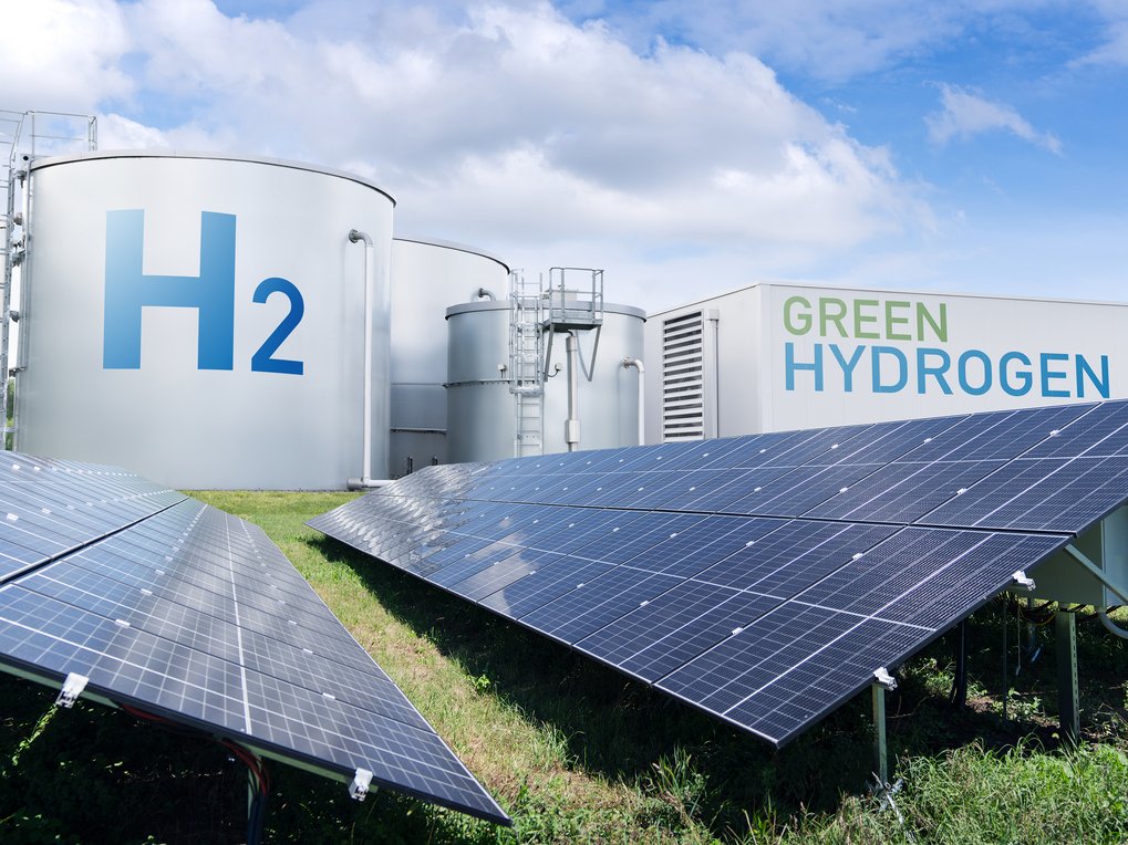 Hydrogen factory with energy storage concept. Green hydrogen production from renewable energy sources. Credit: istock/Scharfsinn86