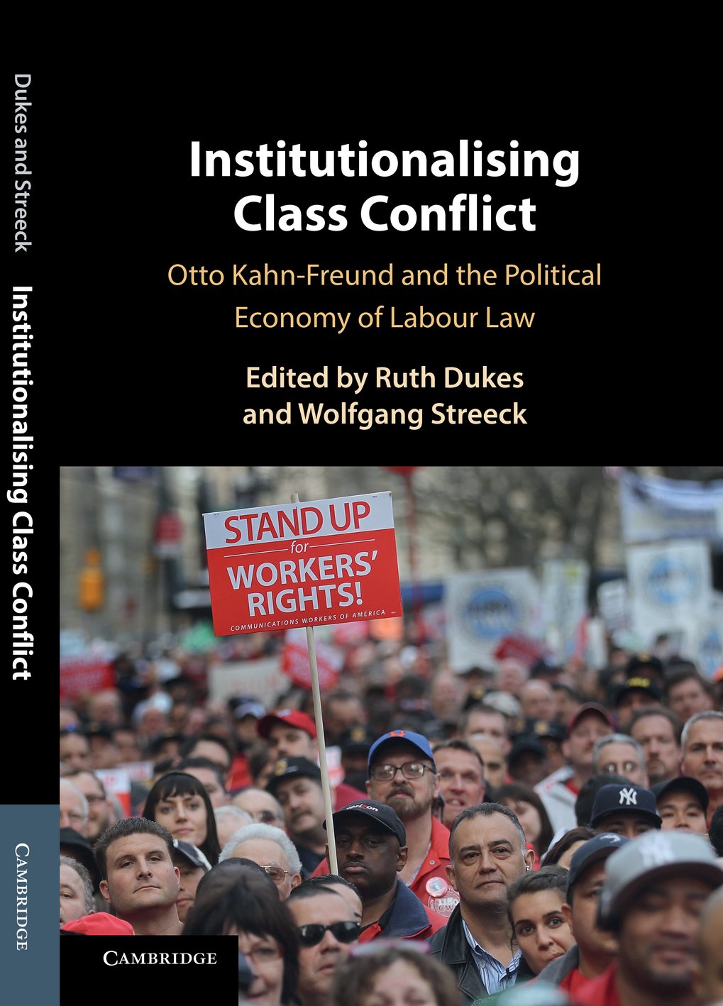 Buchumschlag zeigt Titel „Institutionalising Class Conflict“ und eine Menschenmenge bei einer Demonstration für Arbeiterrechte, darunter ein rotes Schild mit der Aufschrift „Stand Up for Workers' Rights!“.
