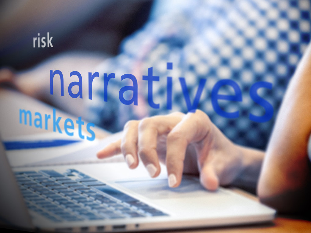 Focused image of a hand on a laptop keyboard, with overlaid text highlighting the concepts of risk, narrative, and markets in bold blue letters.