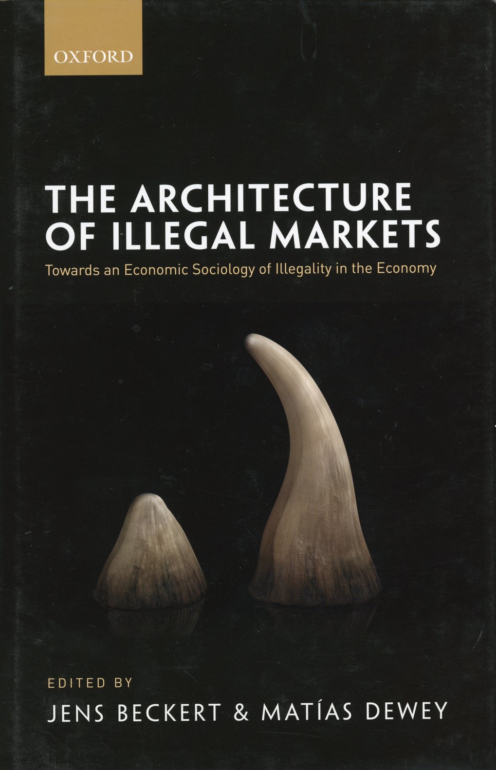 Cover of the book “The Architecture of Illegal Markets” by Jens Beckert and Matías Dewey, featuring two horns on a black background and the Oxford logo.