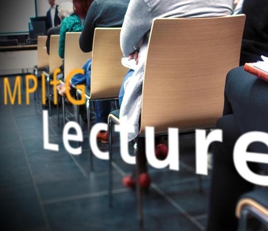 Schriftzug "MPIfG Lecture" vor Sitzreihen